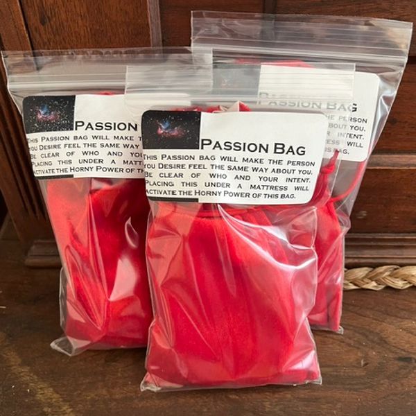 Red passion bags wrapped in plastic with a printed message about desire.