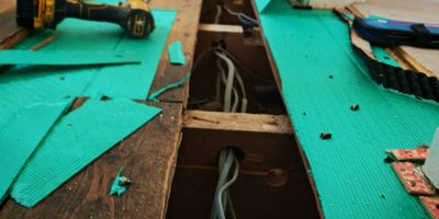 Property in Wolverley, floorboards lifted for new cable runs as part of a house rewire.
