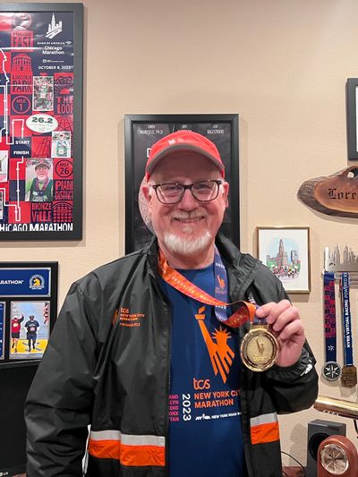 Loren Murfield, after completing the 2023 NYC Marathon, the 6th marathon he ran in the year he turne