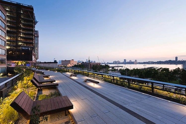 A mesmerizing sunset captured from the High Line in New York City, offering a perfect blend of urban landscape and natural beauty.