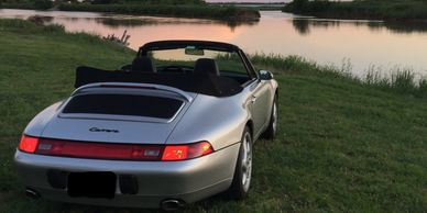 1998 Silver Porsche 993 Cabriolet with top open