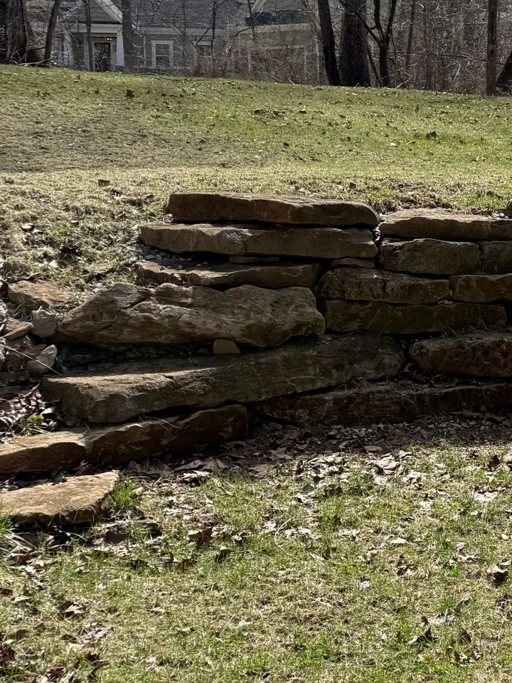 Site excavated rock to build a robust retaining wall for a client. 