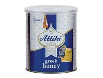 Attiki Greek honey container with a honey drop design.