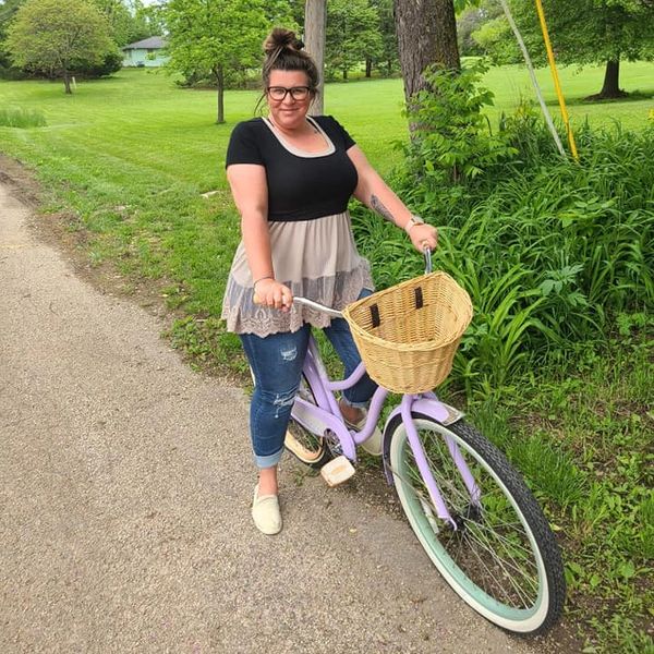 Woman riding a Huffy Cruiser bike