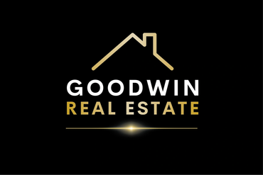 Goodwin Real Estate logo with house outline.
