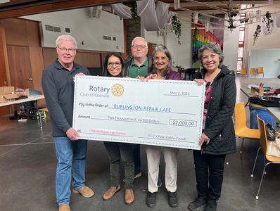 Burlington Repair Cafe receiving  a cheque from the Rotary Club of Oakville