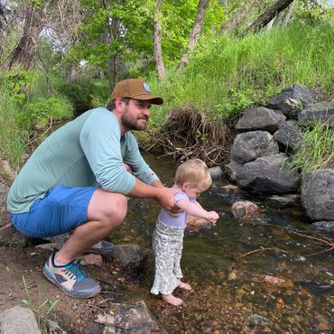 in nature with a hat on