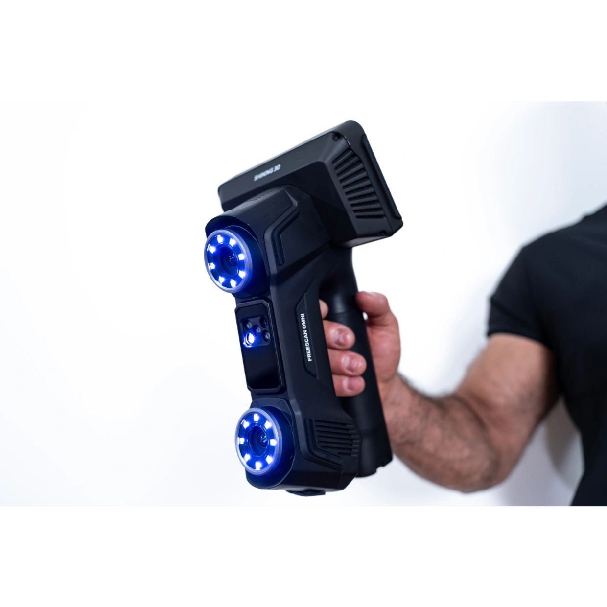Handheld EinScan Rigii v1.2 3D scanner shown in use.