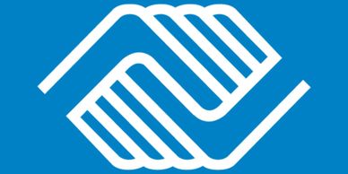 Blue background with white interlocked hands logo.