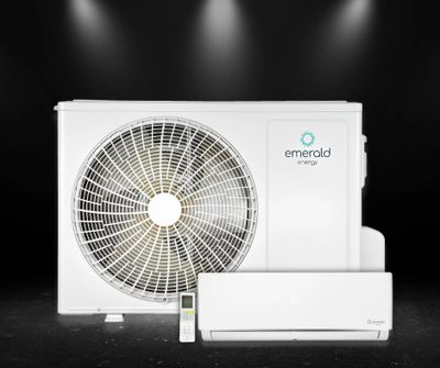 White Emerald Energy air conditioning unit with remote on a dark background.