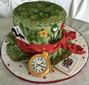 Cakes By Karin created this party pleasing Alice in Wonderland theme hat for a tea shower.  