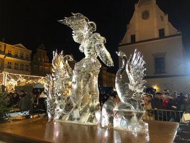 Angel served by swan. Poznan, Poland