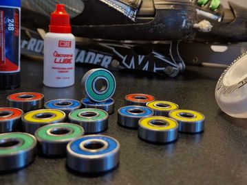 Bearing Servicing showing products, bearing lube, loctite, wheels,bearings skates