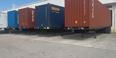 docked containers waiting to be cross docked