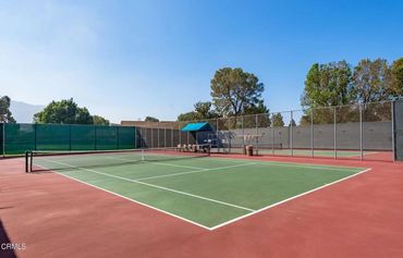 Outdoor tennis  courts at Leisure Village 55+ community in Camarillo, CA — active senior recreation.