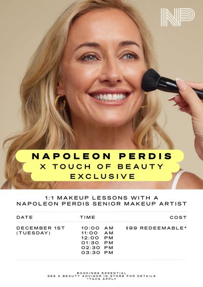 Woman receiving makeup application for a beauty lesson event.