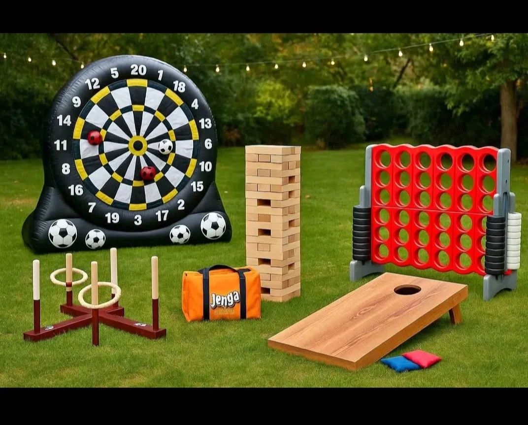 Outdoor lawn games including dartboard, Jenga, Connect Four, ring toss, and cornhole.