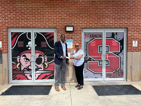 Mrs. Shelia Thompson presenting Shannon High Seniors with a monetary donation on April 20, 2026.