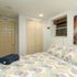 queen bed with view of closet