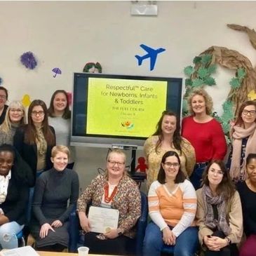 Danielle McLellan-Bujnak with class of Respectful Care® students in a classroom 