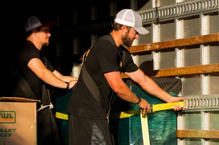 Reed Moving team carefully secures your items inside their trucks.