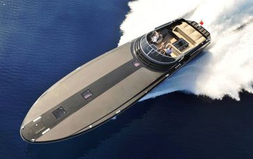 A sleek luxury yacht cruising fast on deep blue water.
