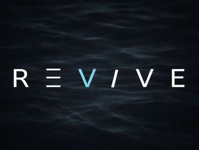 Word REVIVE with stylized letters on a dark water background.