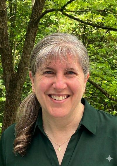 Coach, advocate, and owner of Adoption Options Consulting, LLC, and mother of 3 adopted children, Er