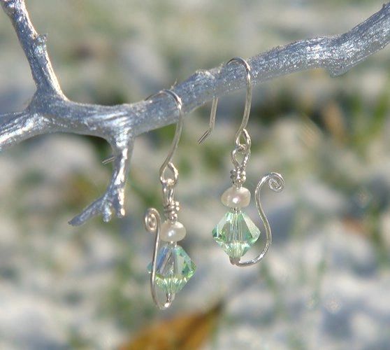 Jasmine's Earrings. Swarovski soft translucent green crystal, freshwater pearl, sterling silver.