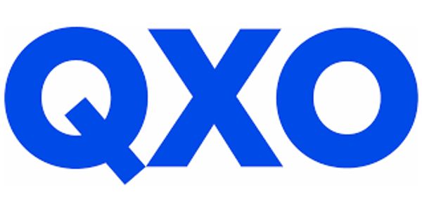 Bold blue letters QXO on a white background.