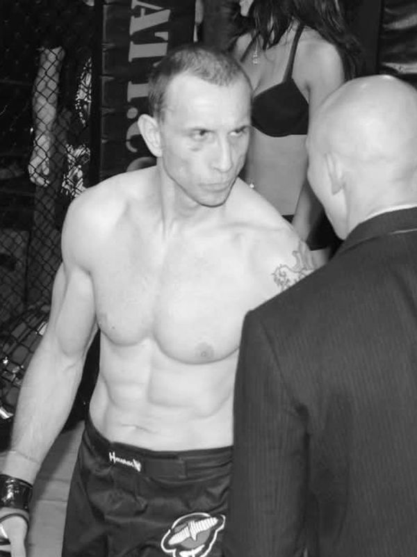 Darren in the ring in an MMA fight.
