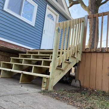 Porch repair: New stair install.