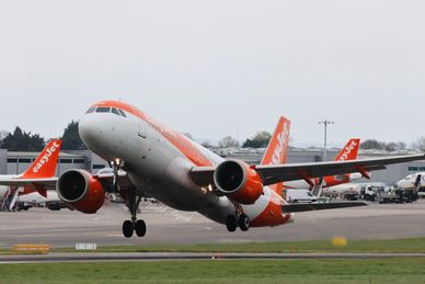 An easyJet airplane taking off from the runway.