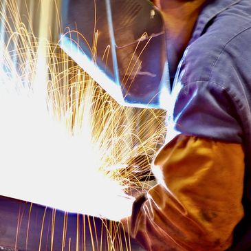 Steel fabrication for hangar & shop door maintenance