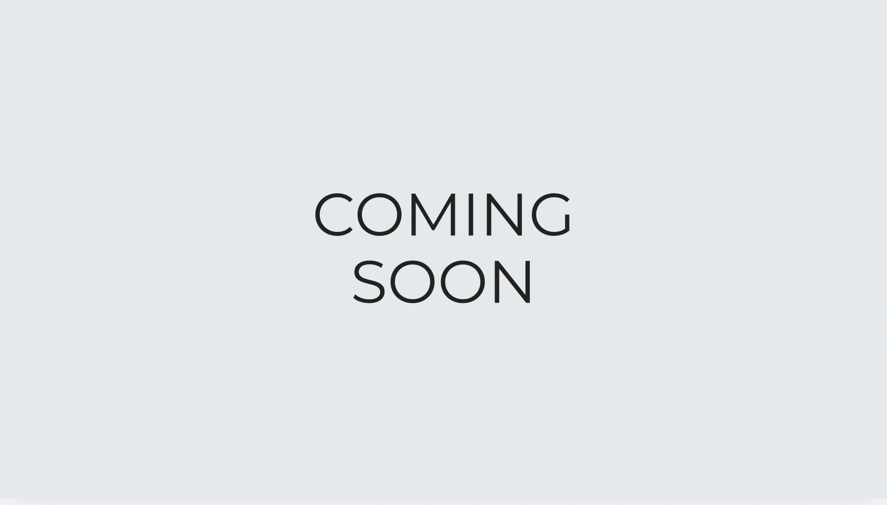Text saying 'COMING SOON' on a plain background.