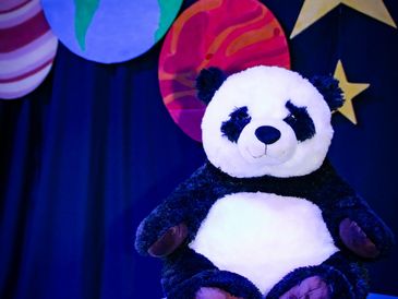 Panda, the worst singer in Lights Out, kids theatre show.