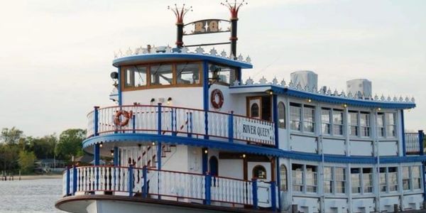 Features a Three Hour Cruise, Open Bar, A Deluxe Dinner Buffet,  Captain, Boat & Catering Crew.