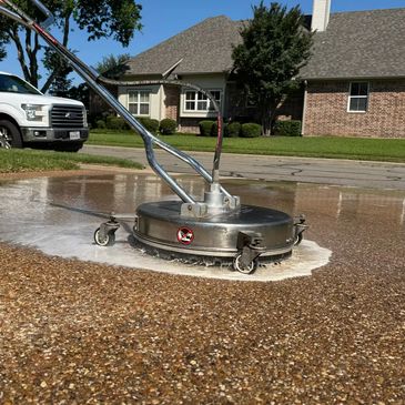 Driveway pressure washing with a surface cleaner