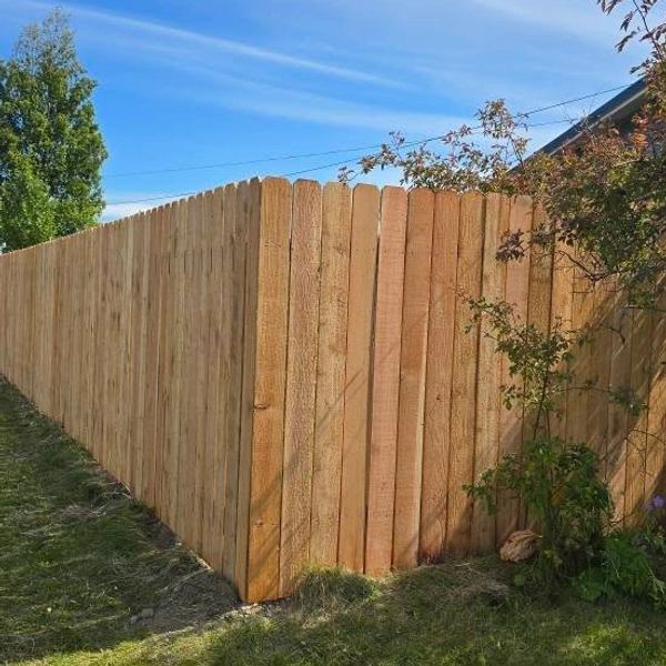 Strong wood fencing—built to endure Alaska’s elements with natural beauty and lasting strength.