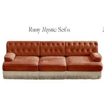 Rusty Mystic Sofa with tufted back and fringe base.
