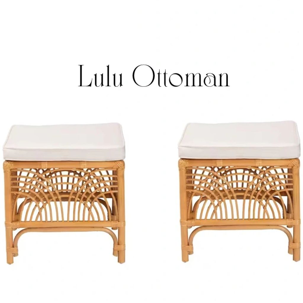 Pair of Lulu Ottoman stools with white cushions and rattan bases.