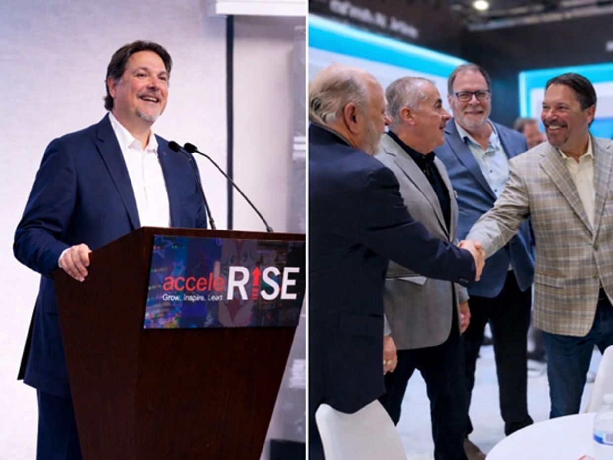 Man speaks at podium and later shakes hands with a group of men at a professional event.