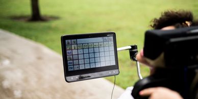 child using Tobii-Dynavox i16 eye-gaze device