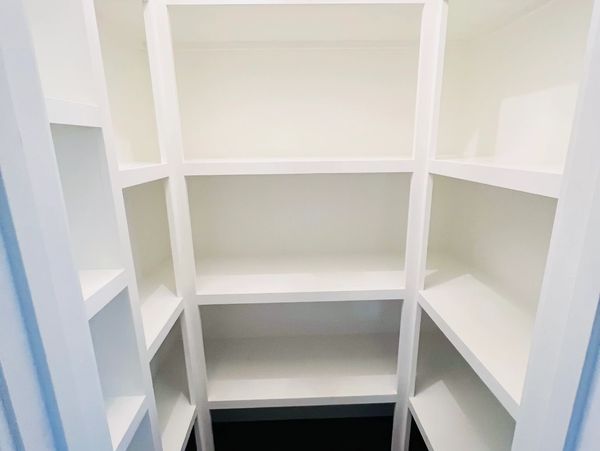 Custom wrap pantry shelving painted white in Republic, MO.