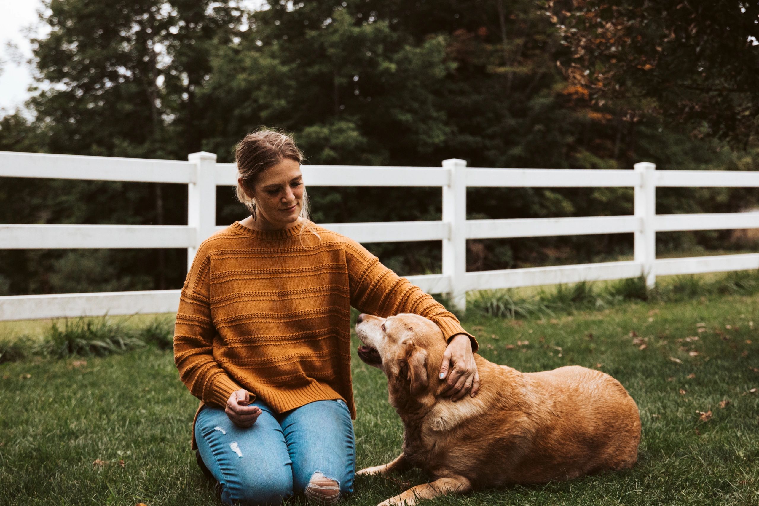 Woman with yellow lab 