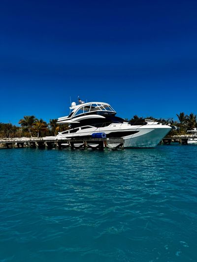 2019 Galeon 640 Fly moored at Norman's Cay, Bahamas. 