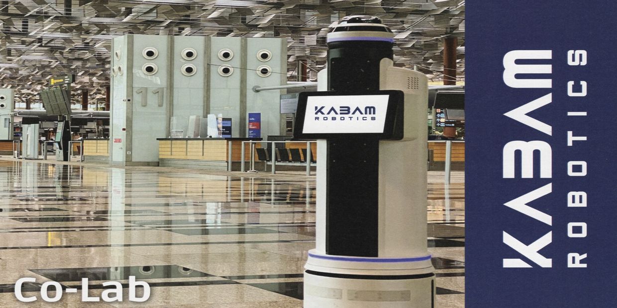 Picture of a company reception with robots