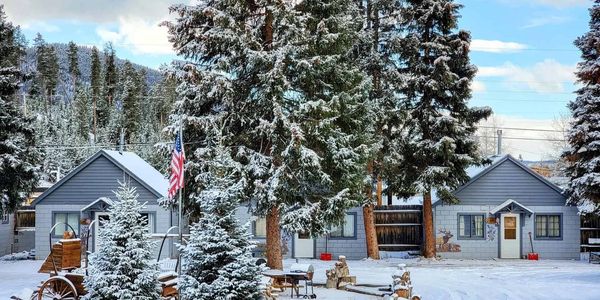 Snowy image of cabin exterior