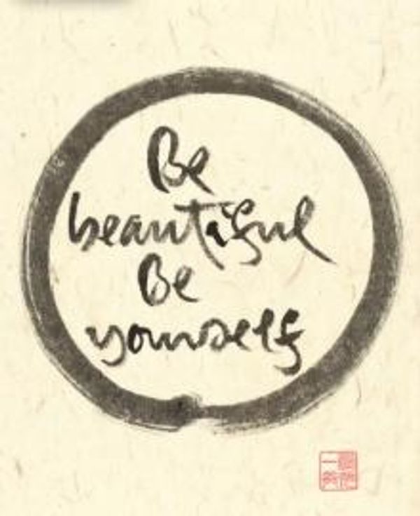 Handwritten motivational quote inside a black circle.