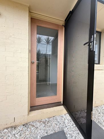 Clear glass laundry door